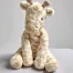A soft giraffe toy for babies from Mama's & Papas from their 'Welcome to the World' range.