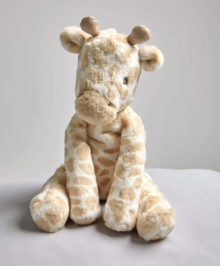 A soft giraffe toy for babies from Mama's & Papas from their 'Welcome to the World' range.